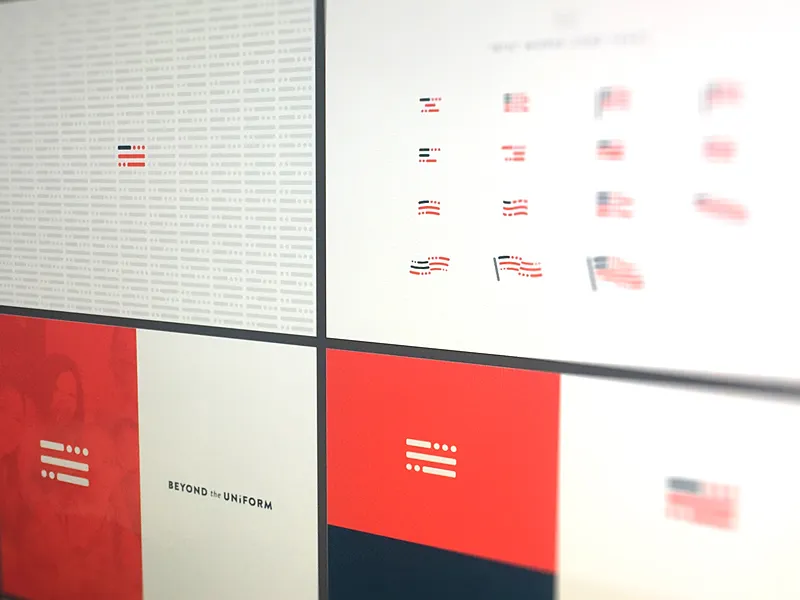 Brand boards on a wall: the flag in a grid of colorways, the wordmark and the red flag panel