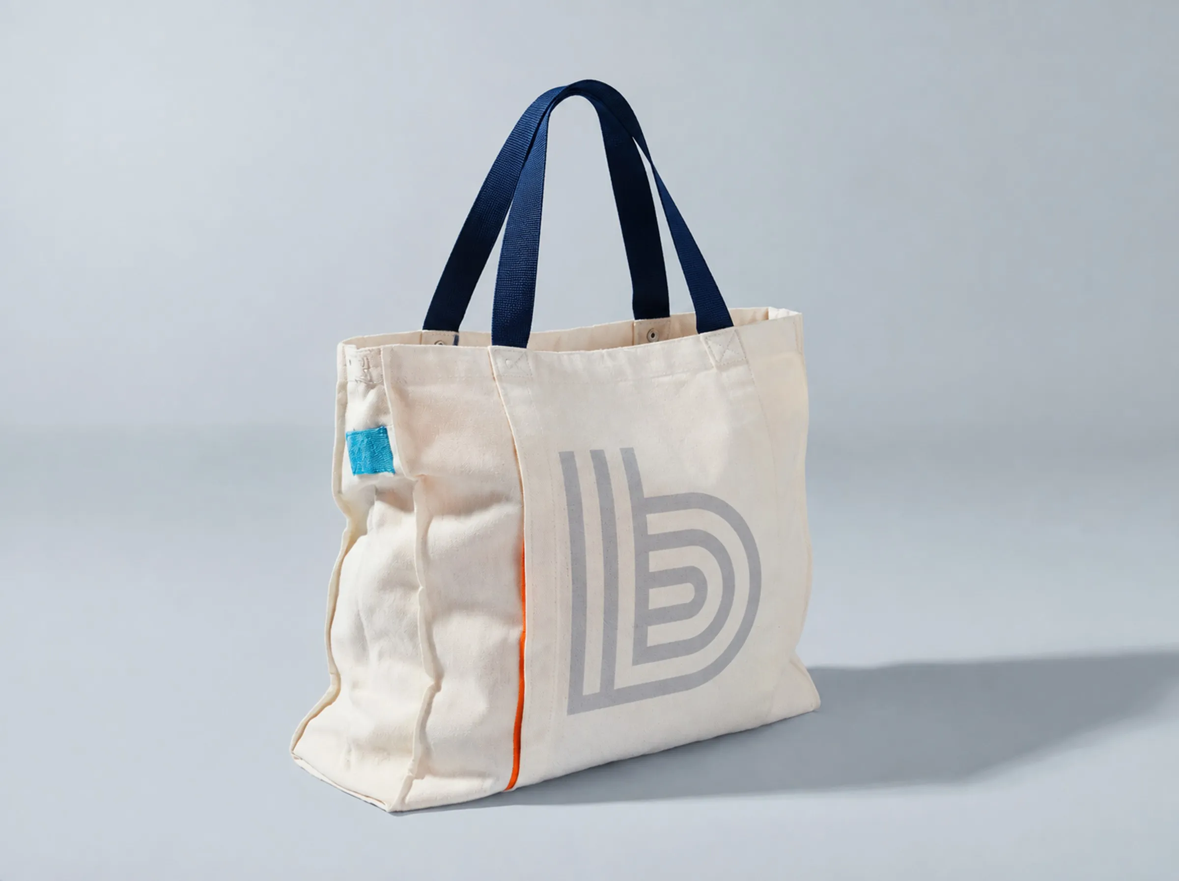 A canvas tote printed with a large pale b