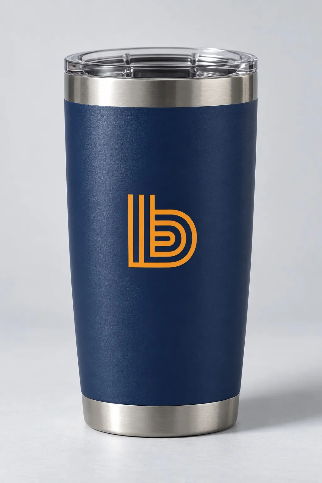 A navy tumbler with the orange b